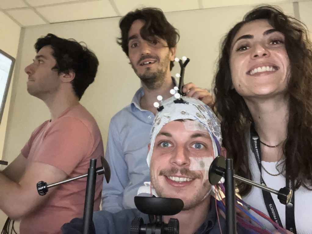 Tobias Eder with collaborators during an EEG experiment session